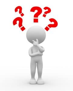 Dirigeant d'entreprise se posant des questions pour illustrer les questions à poser lors de l'entretien annuel d'évaluation